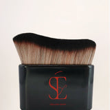 a photo of our body applicator brush for applying our attention seeker shimmer oil with no mess