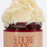 a close up shot of the strip tease body scrub for body acne, hyperpigmentation, strawberry legs and clogged pores