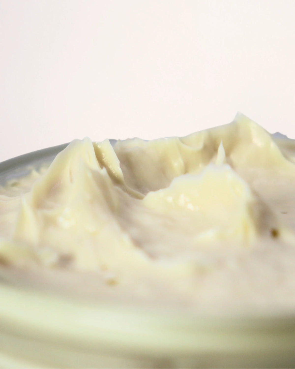 a texture shot of our emulsified body butter cream for dry skin eczema and flaky skin conditions