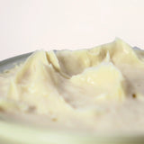 a texture shot of our emulsified body butter cream for dry skin eczema and flaky skin conditions