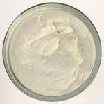 a birds eye shot of the secret obsession moisturising and hydrating body whip for dry skin and eczema and dull skin conditions