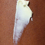 a close up texture shot of the thick secret obsession body whip cream for eczema dry skin and dull skin