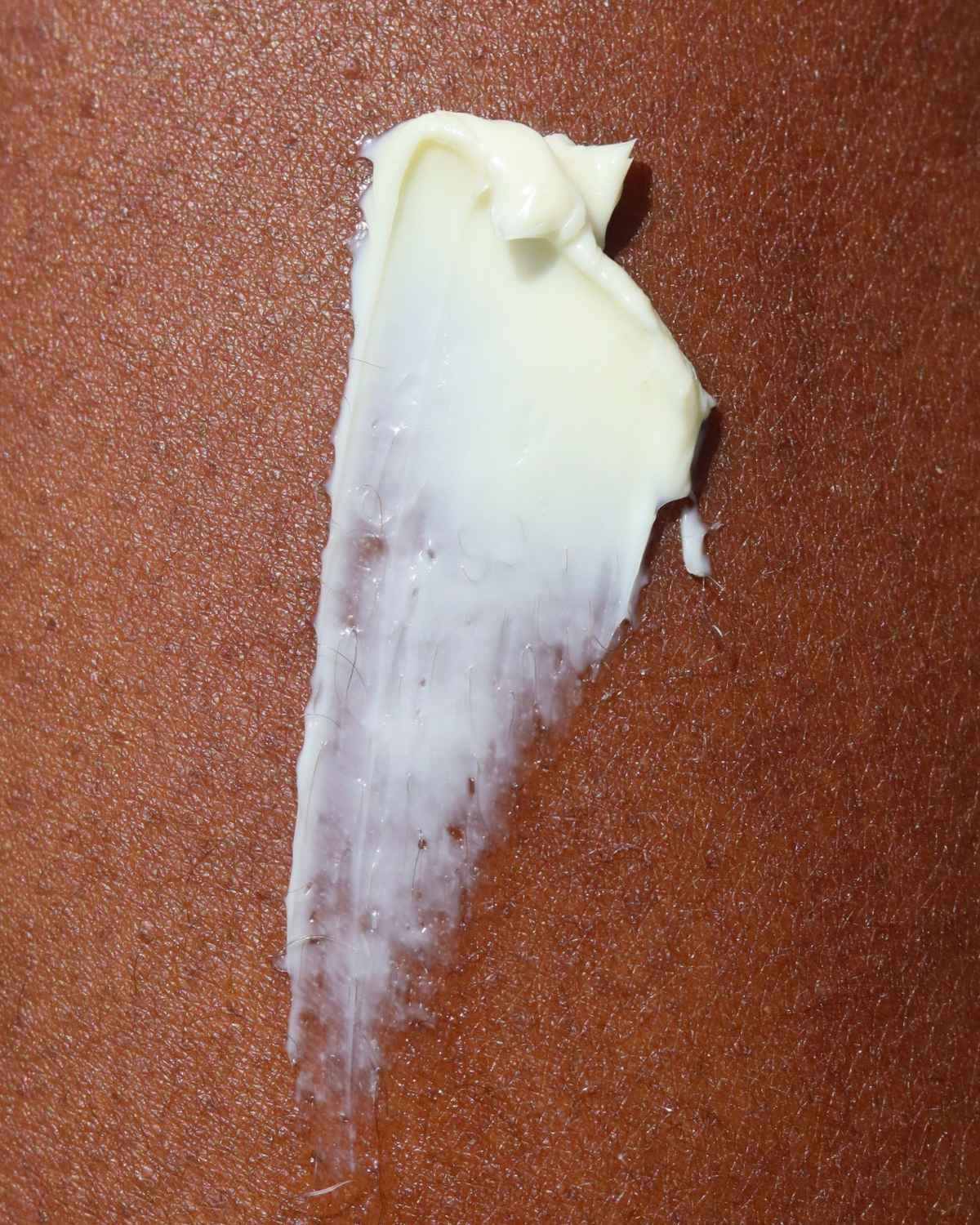 a close up texture shot of the thick secret obsession body whip cream for eczema dry skin and dull skin